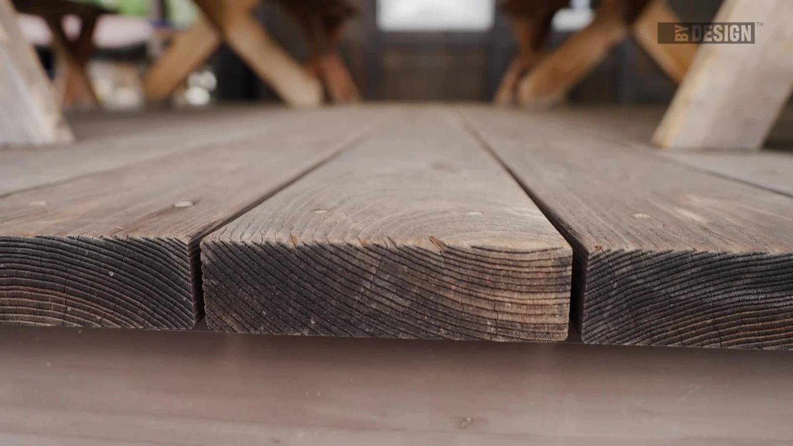 Close view of the grain and board ends of the wood decking featured in the BYDesign spotlight